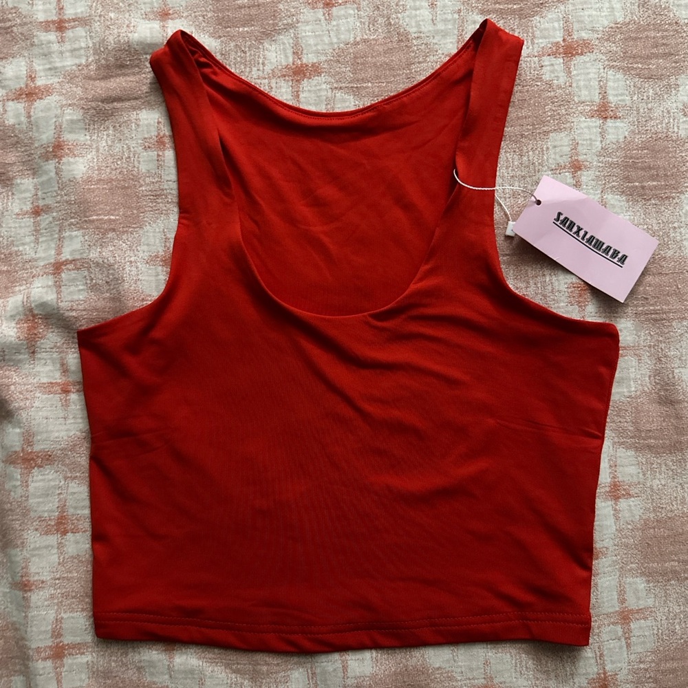 Sleek Red Tank Top by [Brand]